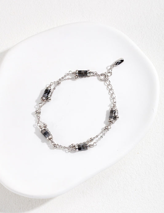 Sterling silver bracelet with double chain and glitter stone