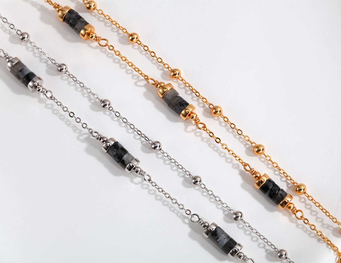 Sterling silver bracelet with double chain and glitter stone