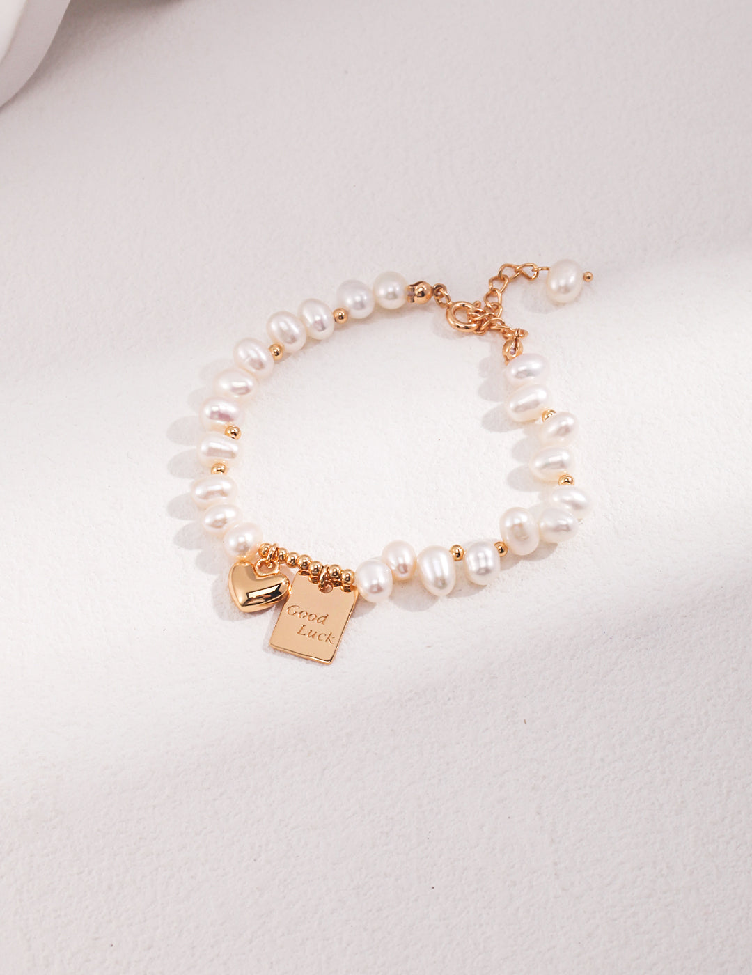 Sterling Silver Pearl Bracelet with Charms